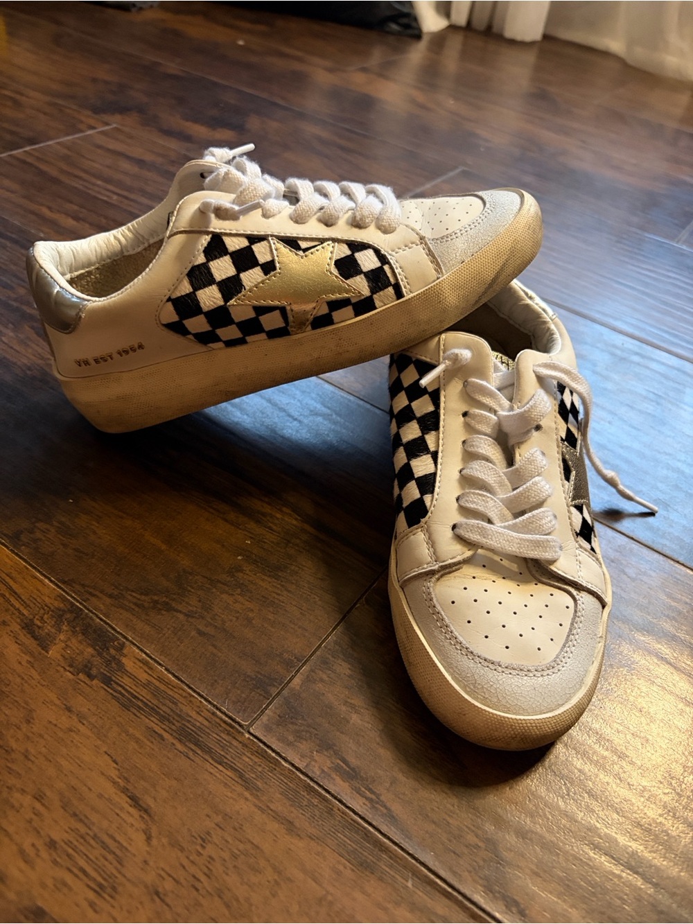 White and Black Checker Low-Top Sneakers with Gold Star Accent